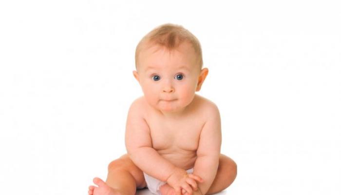 A three-month-old baby is trying to sit up - is it too early?